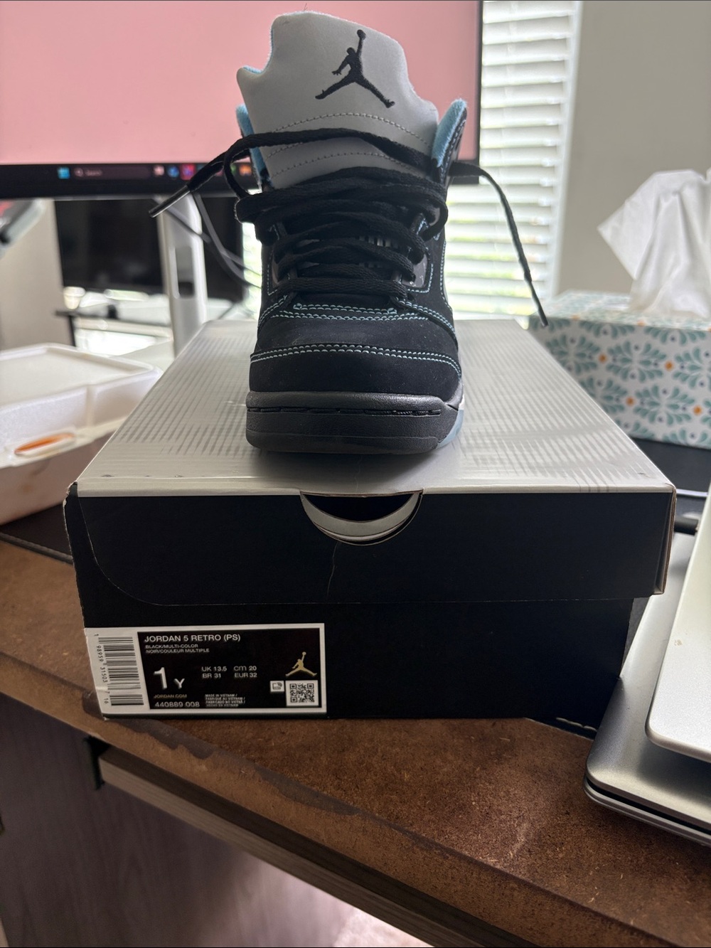 Jordan Retro Black with Light Blue Accent Sneakers